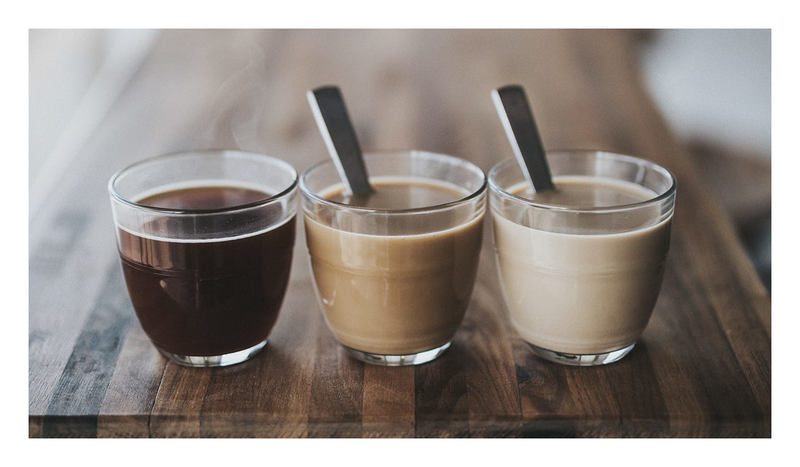 an image of three different cups of coffee, each with different shades